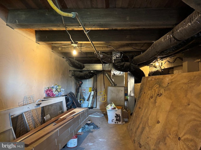 basement with heating unit and water heater