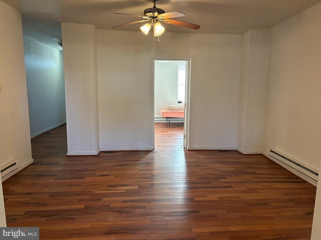 empty room featuring ceiling fan, dark hardwood / wood-style flooring, and baseboard heating