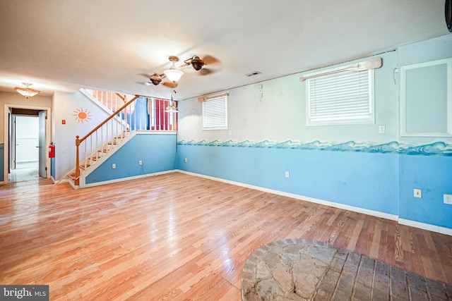 unfurnished room with hardwood / wood-style floors