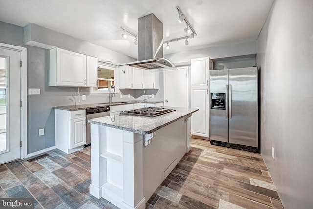 kitchen with hardwood / wood-style floors, a center island, white cabinets, appliances with stainless steel finishes, and island range hood