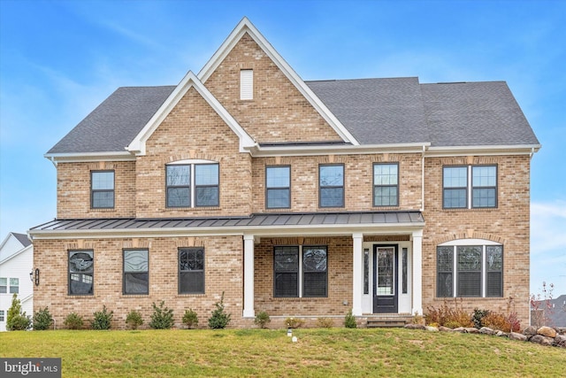 view of front of home featuring a front lawn