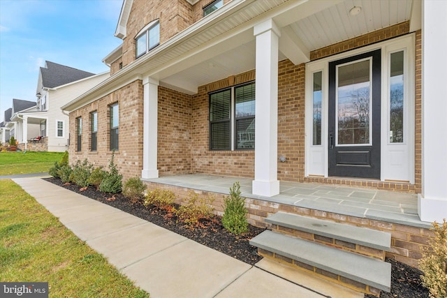 entrance to property with covered porch