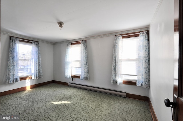 unfurnished room featuring carpet flooring, a wealth of natural light, and a baseboard radiator