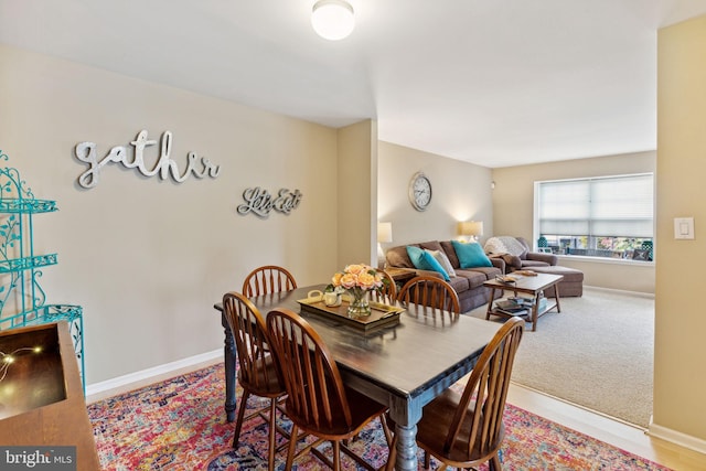 view of carpeted dining room