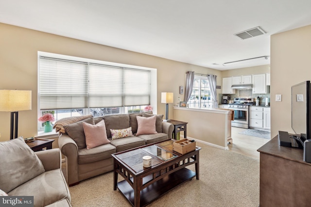 living room with light carpet