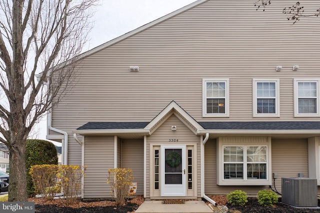 view of front of house featuring central AC unit