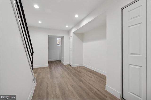 corridor featuring light hardwood / wood-style flooring