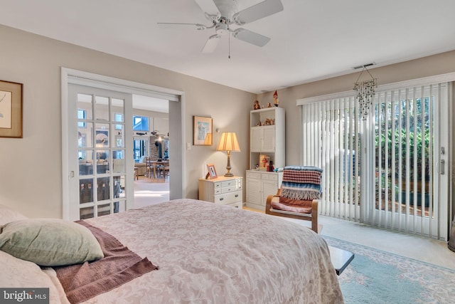 bedroom featuring access to exterior, carpet, and ceiling fan