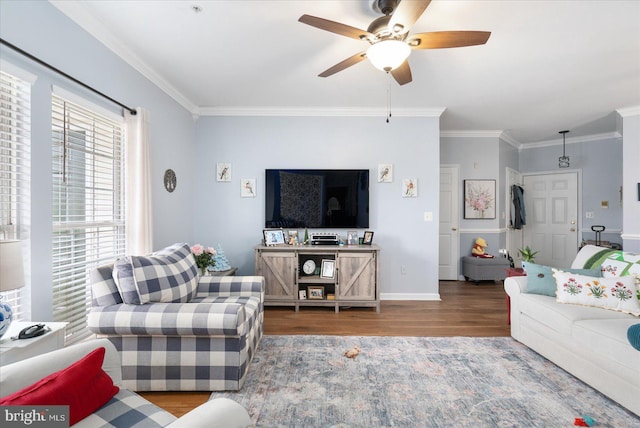 living room with crown molding, ceiling fan, and hardwood / wood-style floors