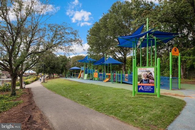 view of play area with a yard