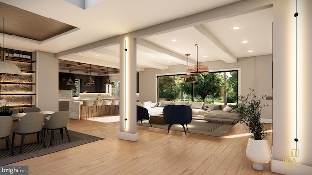 interior space featuring beam ceiling and light hardwood / wood-style floors