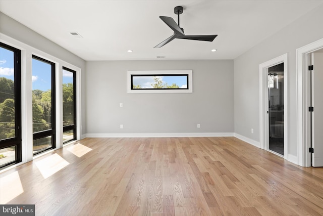 unfurnished room featuring light wood finished floors, recessed lighting, baseboards, and ceiling fan