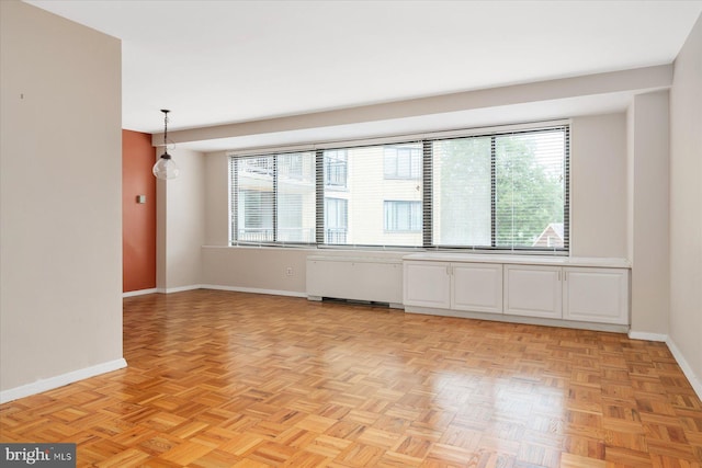 empty room featuring light parquet flooring