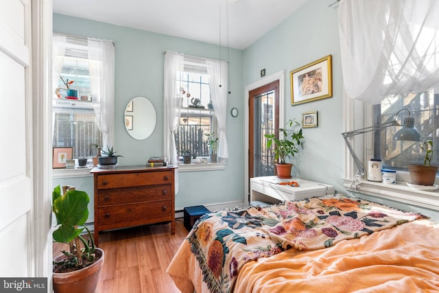 bedroom with wood finished floors