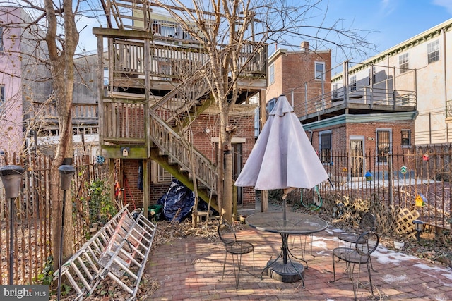 view of patio with stairway