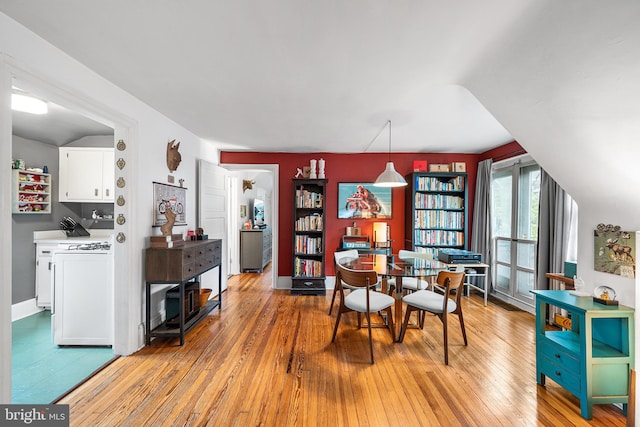 dining room with light wood-type flooring