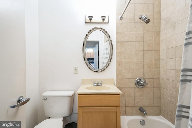 full bathroom featuring vanity, toilet, and shower / bathtub combination with curtain