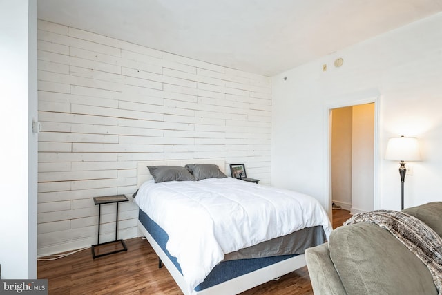 bedroom featuring hardwood / wood-style floors