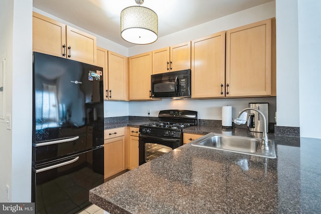 kitchen with kitchen peninsula, light brown cabinetry, sink, and black appliances