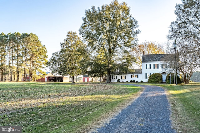 view of front of home featuring a front lawn