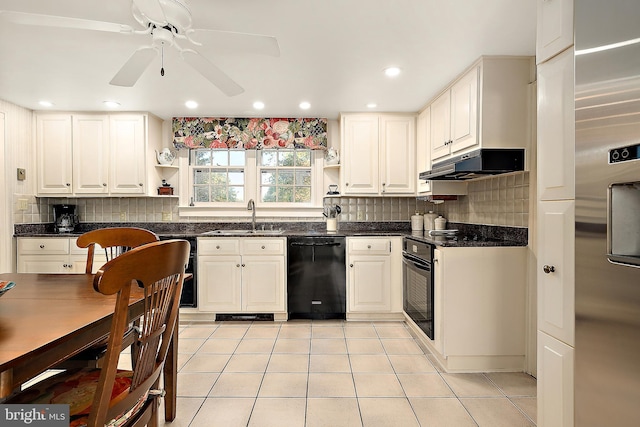 kitchen with light tile patterned floors, sink, white cabinetry, and black appliances