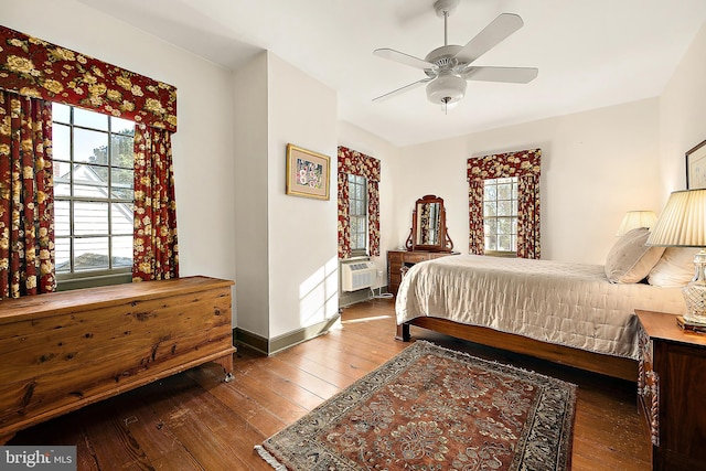 bedroom featuring ceiling fan and wood-type flooring