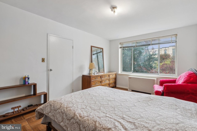 bedroom with parquet floors