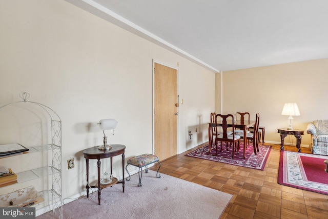 interior space featuring parquet flooring