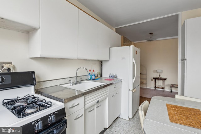 kitchen with white cabinetry, sink, and white appliances