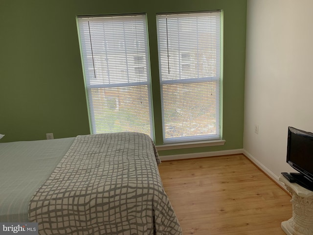 bedroom featuring light wood-type flooring