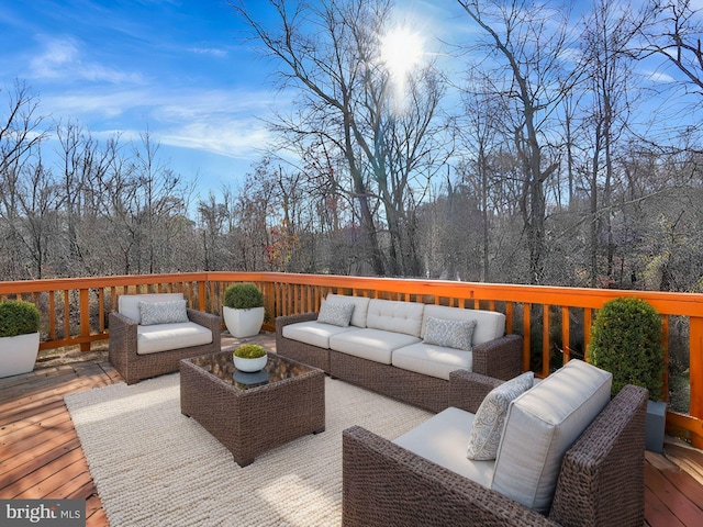 deck with an outdoor hangout area