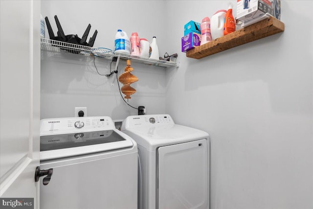 laundry room with washer and clothes dryer