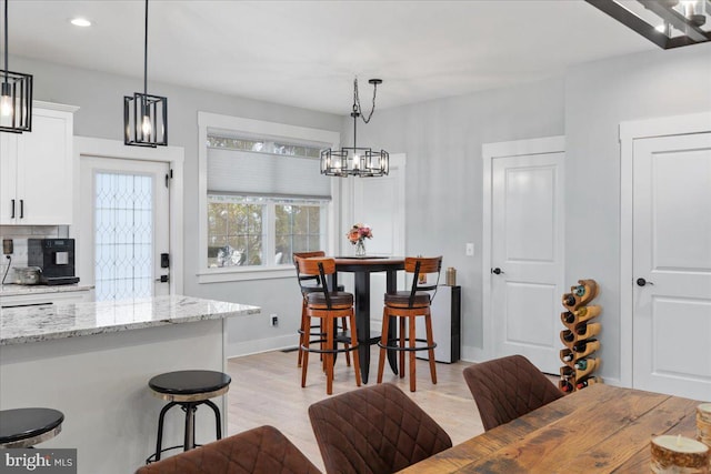 dining space featuring light hardwood / wood-style floors