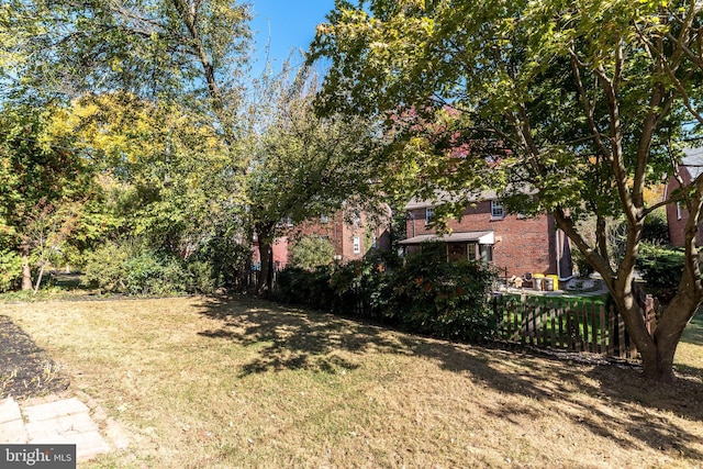 view of yard with fence