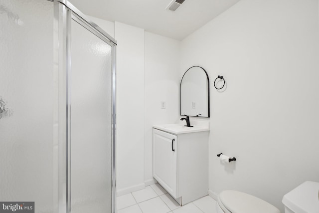 full bathroom featuring a stall shower, visible vents, toilet, tile patterned floors, and vanity