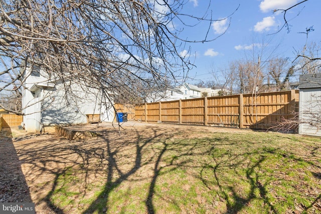 view of yard featuring a fenced backyard