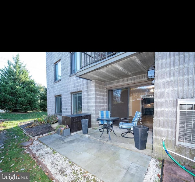 view of patio with a balcony