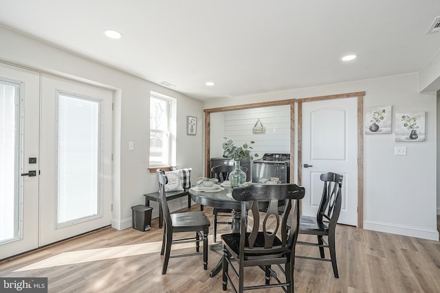 dining room with light hardwood / wood-style floors