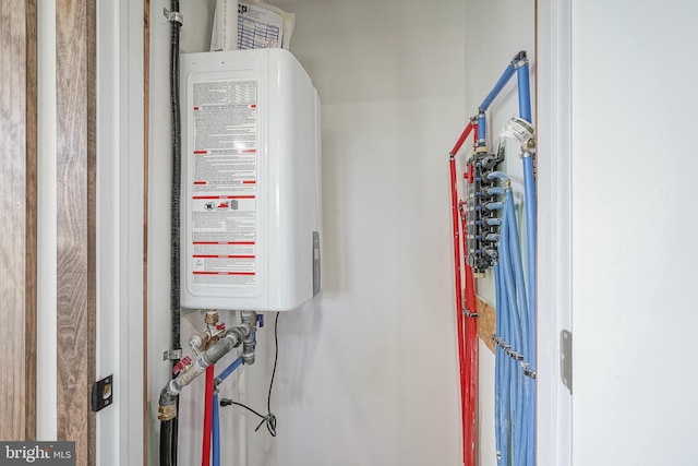 utility room with water heater