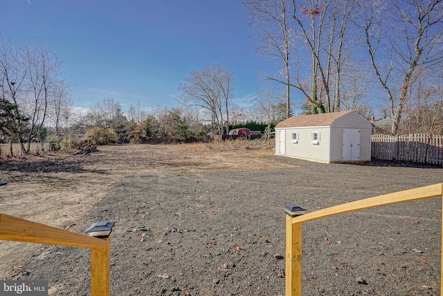 view of yard with a shed