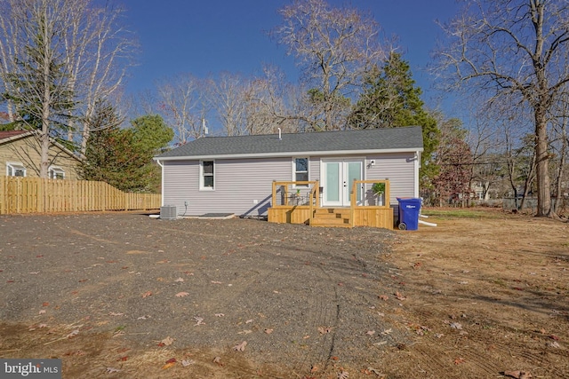 back of property with cooling unit