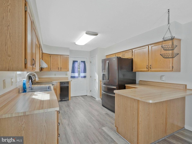 kitchen featuring sink, stainless steel fridge with ice dispenser, ventilation hood, light hardwood / wood-style floors, and light brown cabinetry