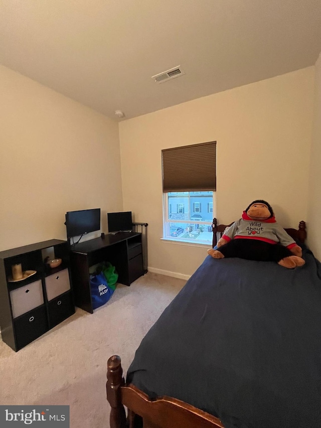 bedroom featuring carpet