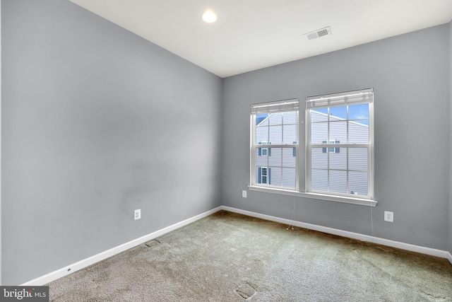 view of carpeted spare room