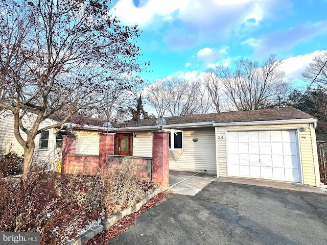 single story home featuring a garage