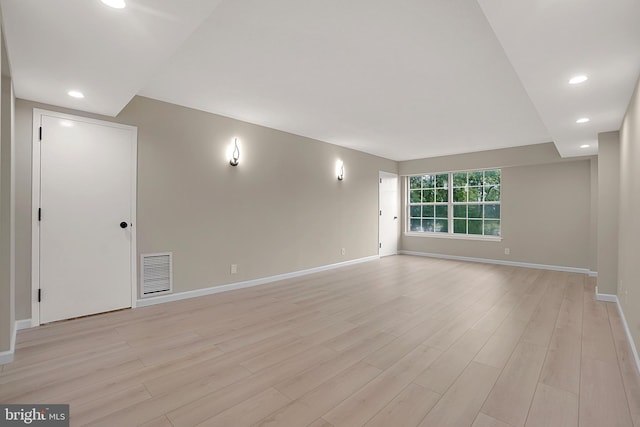 unfurnished room featuring light hardwood / wood-style floors