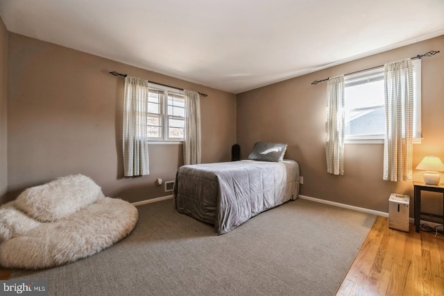 bedroom featuring light hardwood / wood-style floors