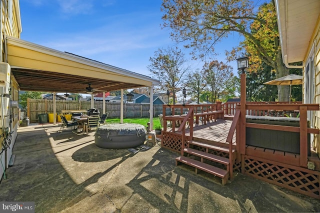 exterior space featuring ceiling fan