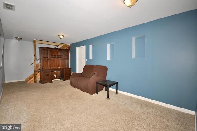 living area with carpet floors