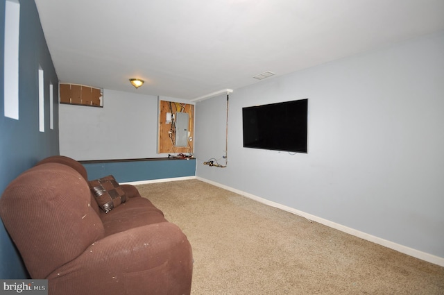 living room with carpet and electric panel